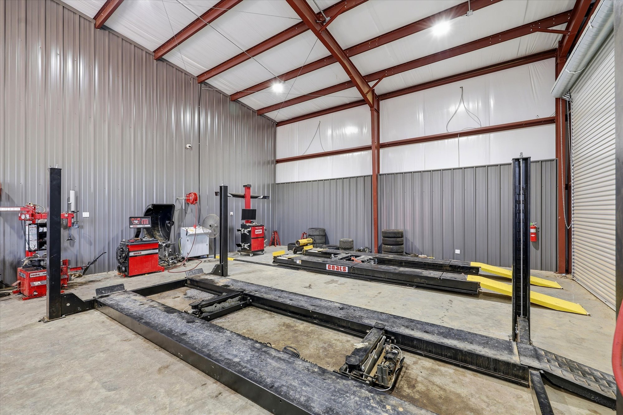Service bay with vehicle lifts and alignment racks at Wilkerson's Diesel & Tire, Jackson MS
