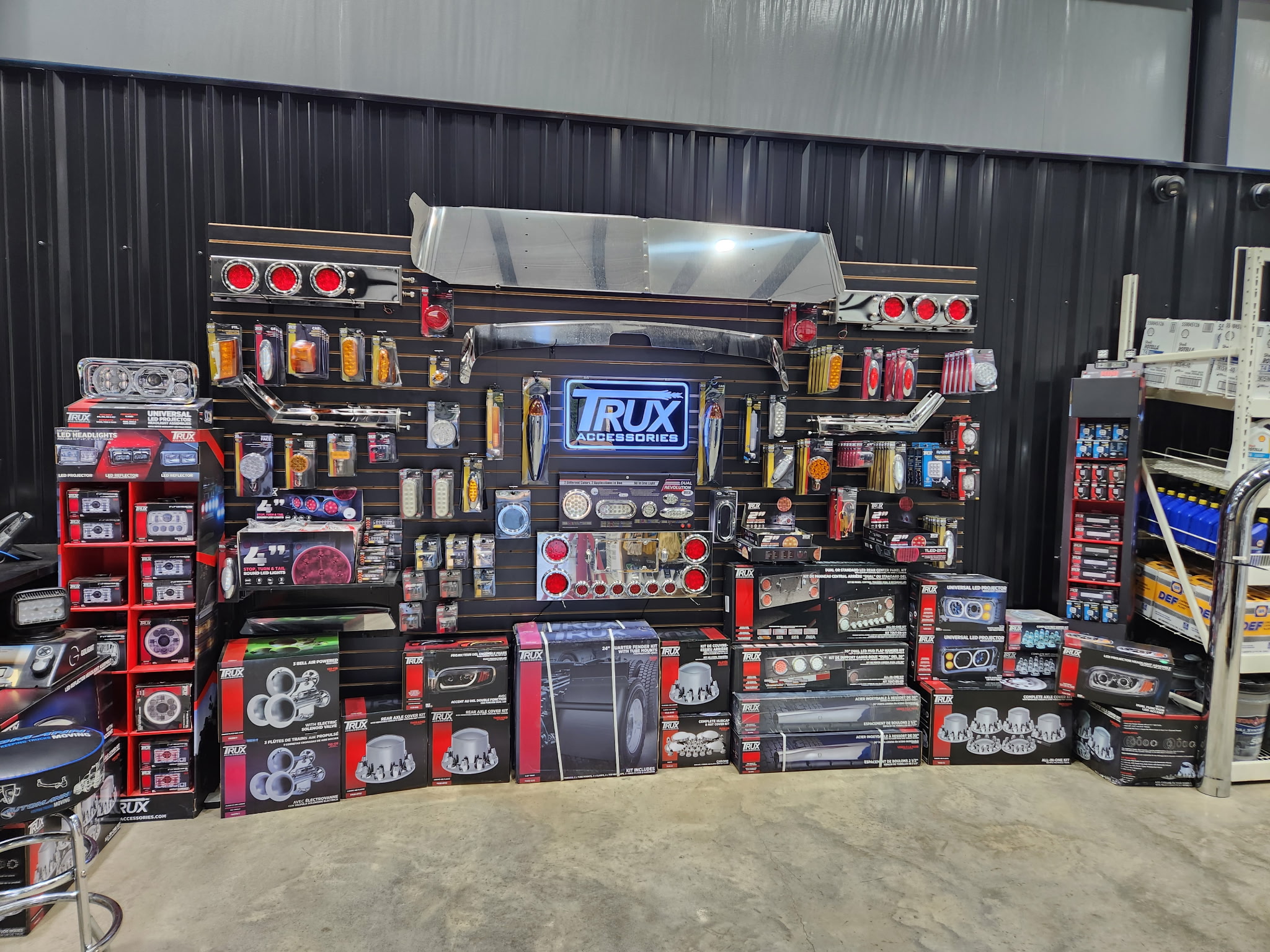 Wilkerson big-truck parts wall stocked with lighting, chrome, and accessory displays